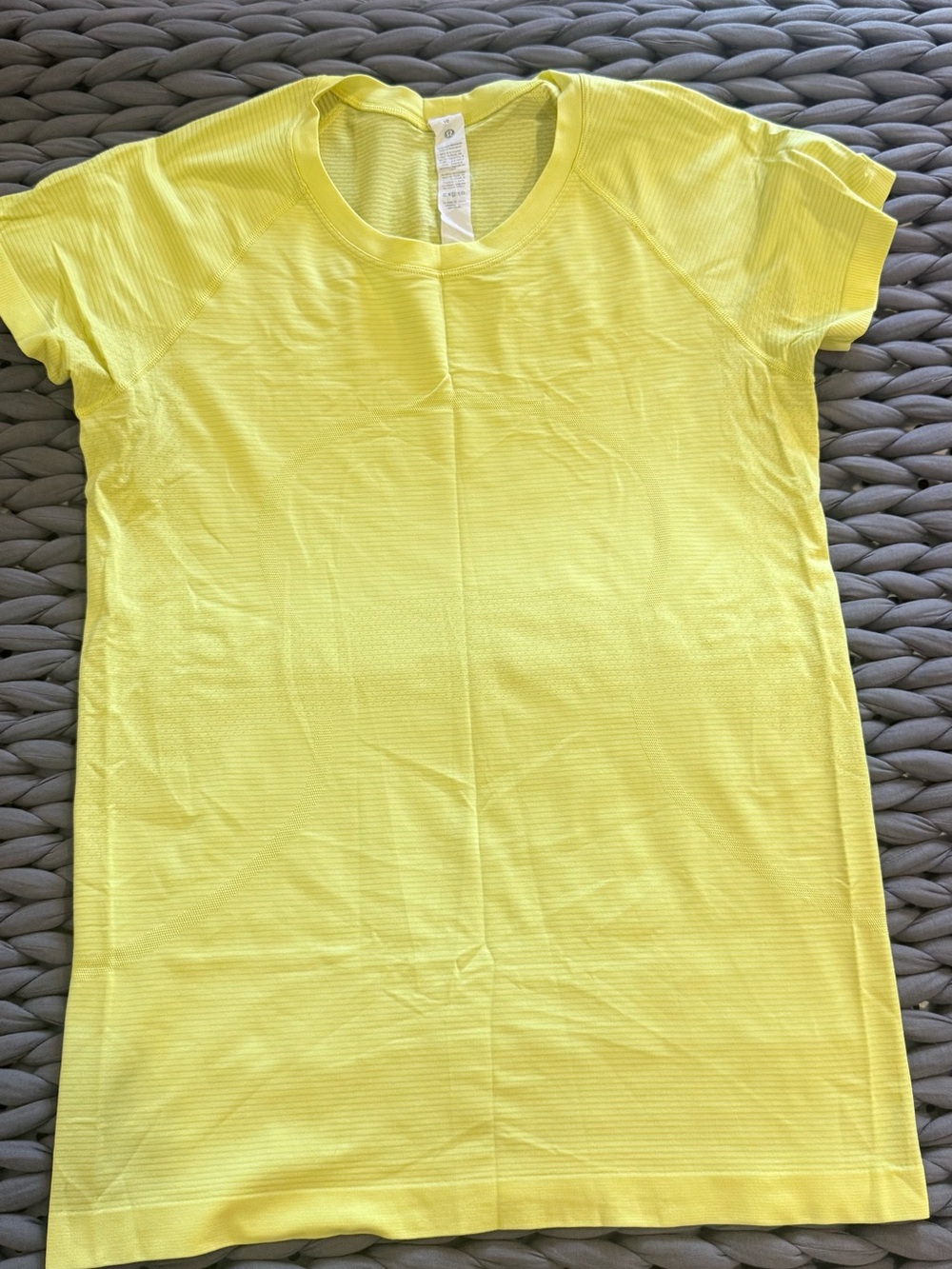 Lululemon Swiftly Tech hip length. Short sleeve. Size 10